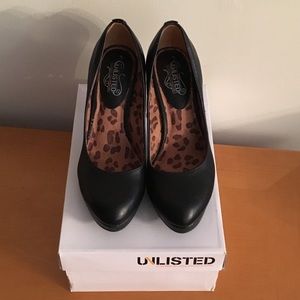 Black platform heels. Brand new.